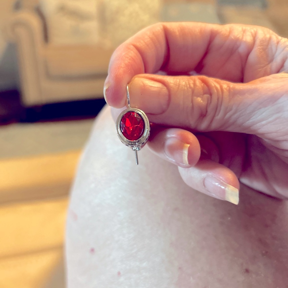 Beautiful pierced earrings . Ruby crystals